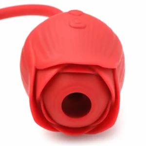Red rose-shaped silicone object with open center.
