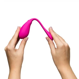 Hands holding flexible pink object