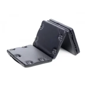 Black leather exercise pad for fitness or yoga.