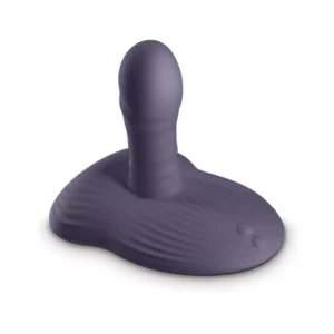 A purple thrusting vibe pad by Inya.